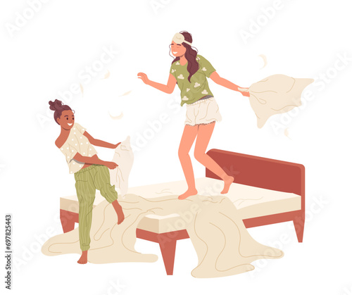 Happy carefree sisters cartoon characters enjoying fun pillow fight on bed at pajama party