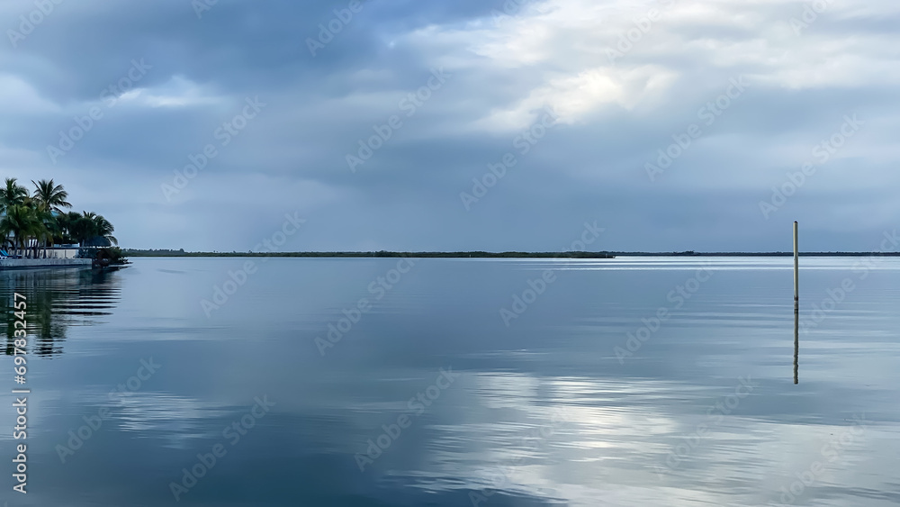 Blue Silver Gray Sky and Cloud Reflections in Water in Florida Keys Blue Silver Gray Sky and Cloud Reflections in Water in Florida Keys