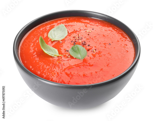 Bowl of delicious tomato cream soup isolated on white