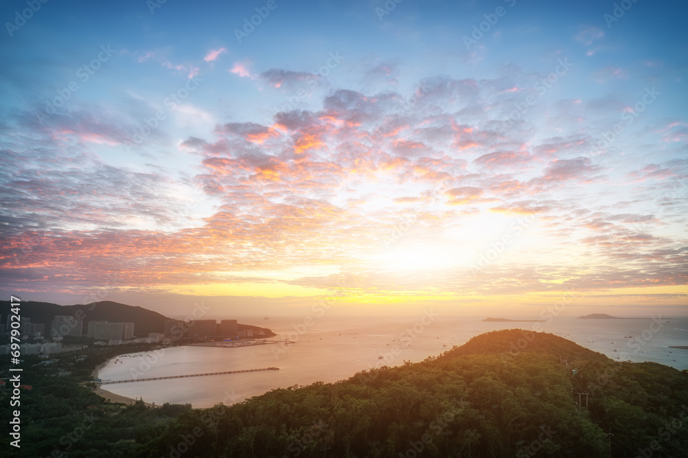 Aerial photography of the scenery of Sanya Island under sunset..