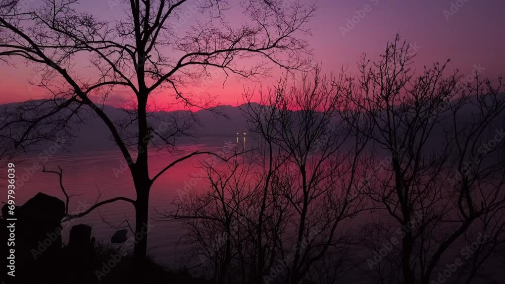 Drone on dusk on the lake. Purple sky and lake reflection. Drone on dusk on the lake. Purple sky and lake reflection.