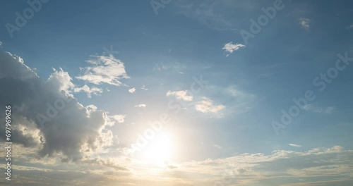 Clouds timelapse. Blue sky with clouds background. Sky clouds slow motion. Sun light ray. Clouds with Sun Rise. Sunset Timelapse with Sun Rise.