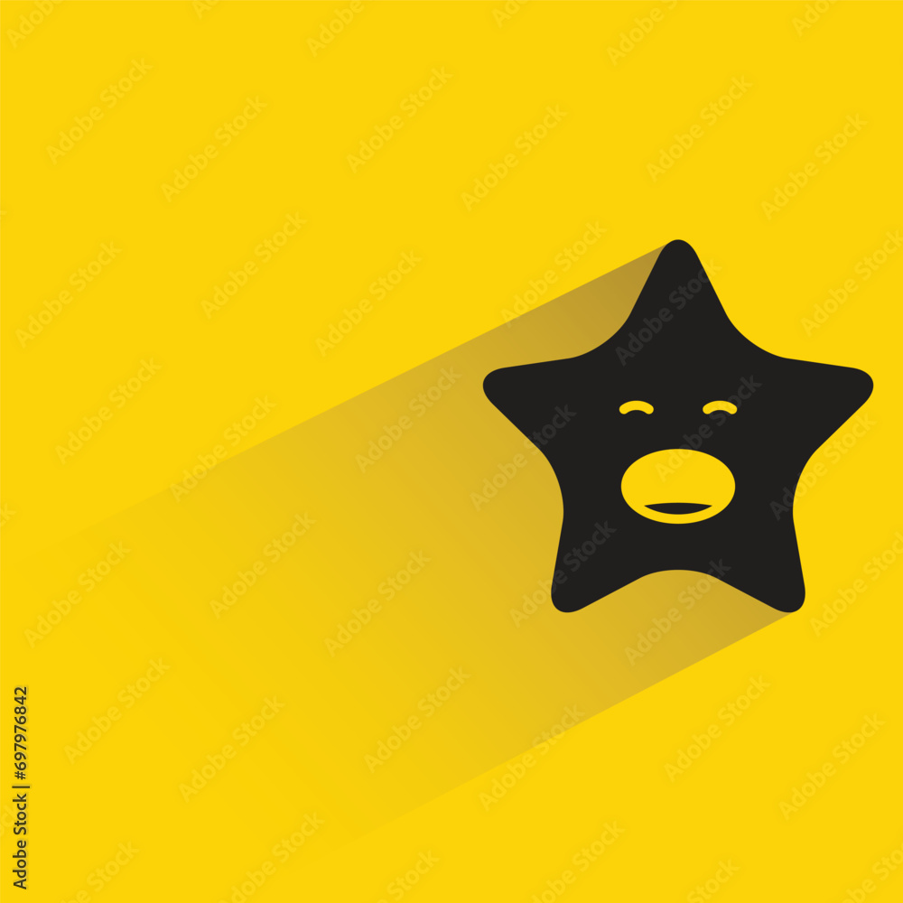 Fotografie star emoji with shadow on yellow background