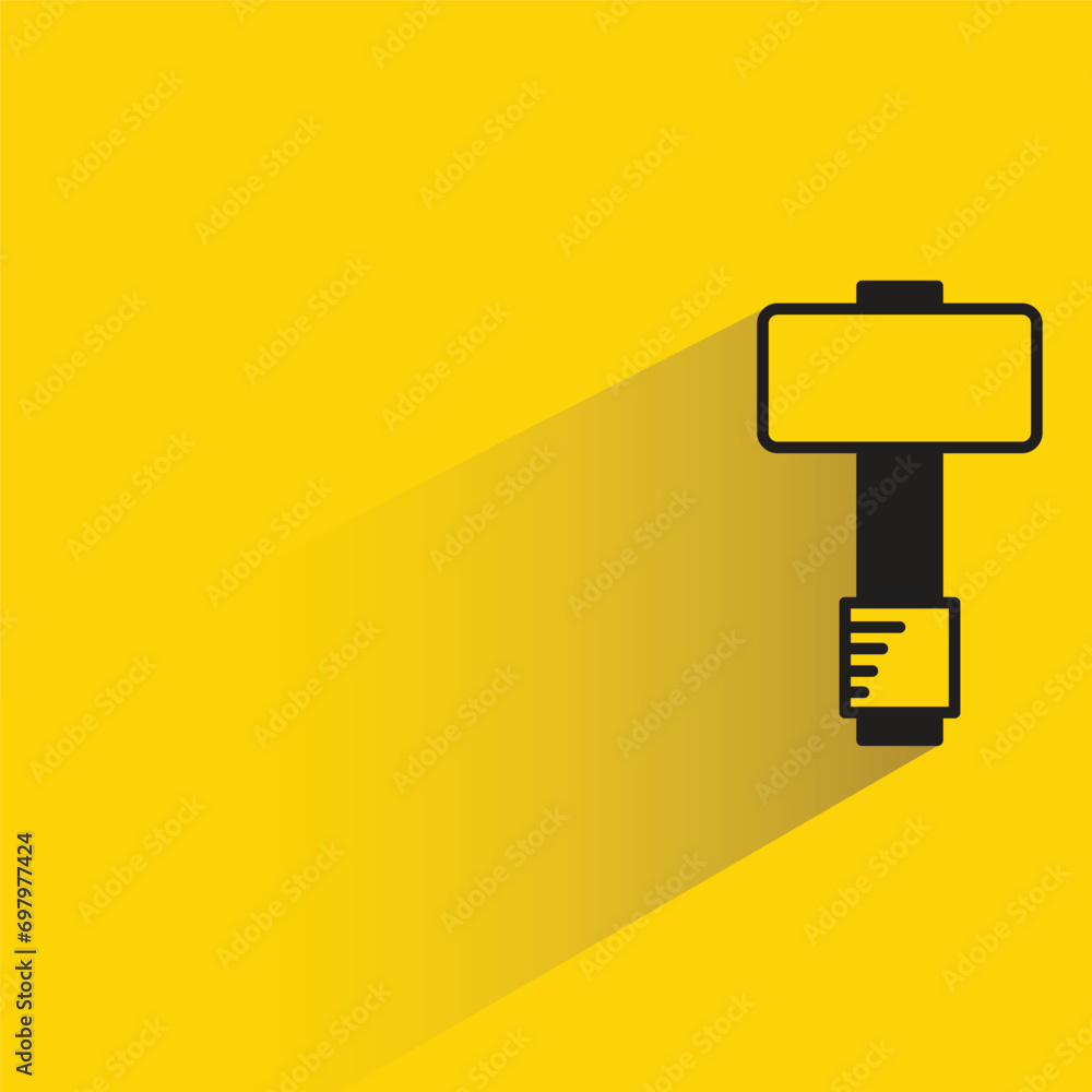 Obraz na plátně hammer with shadow on yellow background