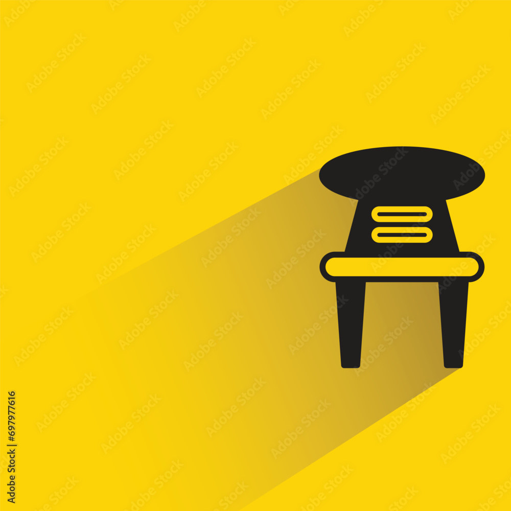 chair icon with shadow on yellow background