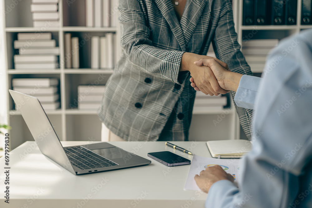 Thank you for letting me be part of the team. Cropped view of two businessmen shaking hands during meeting for success in job interview in business office Thank you partner, close-up photo - obrazy, fototapety, plakaty 