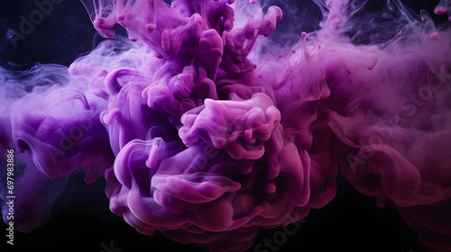 purple and blue colors mixing, smoke effect in water. Thick colorful smoke purple, pink, red, blue on a black isolated background