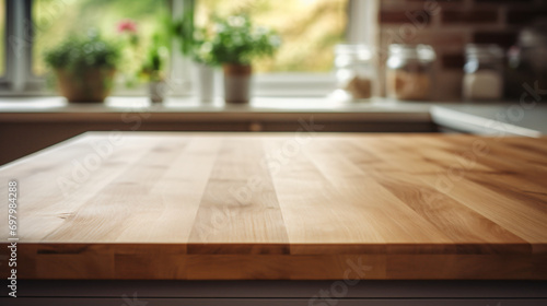 Blurred kitchen counter with a wooden table surface photo
