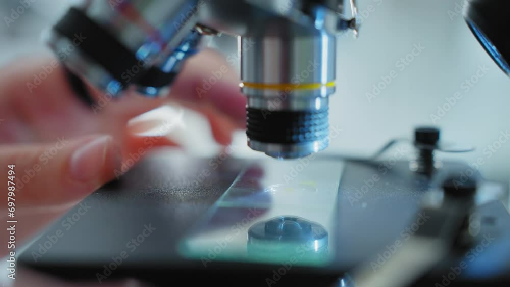Scientists using microscope in Bio lab and experiment, Concept science and technology Scientists using microscope in Bio lab and experiment, Concept science and technology