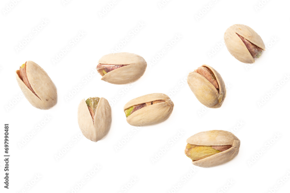 Fresh pistachios isolated on white background. Macro Fresh pistachios isolated on white background. Macro