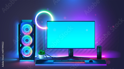 Powerful PC or gaming desktop computer. Gaming computer on table front view. Gaming desktop computer with neon led light of PC. Mock up of empty screen of gaming computer for video games. Workplace.