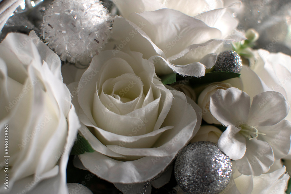 Closeup view of a bouquet of white artificial roses Closeup view of a bouquet of white artificial roses