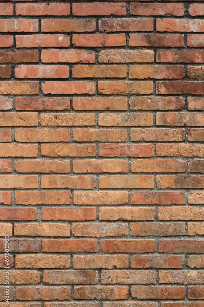 Old brickwork. Vertical photo. Wall texture.