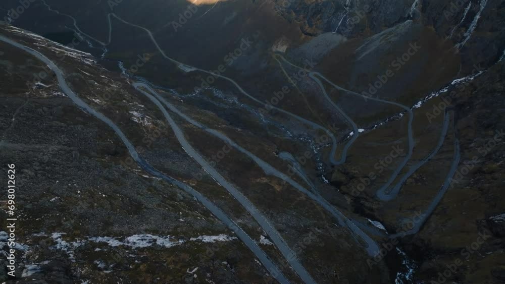 aerial view over trollstigen trolls ladder path road and bridge over stigfossen waterfall in norway mountains aerial view over trollstigen trolls ladder path road and bridge over stigfossen waterfall in norway mountains