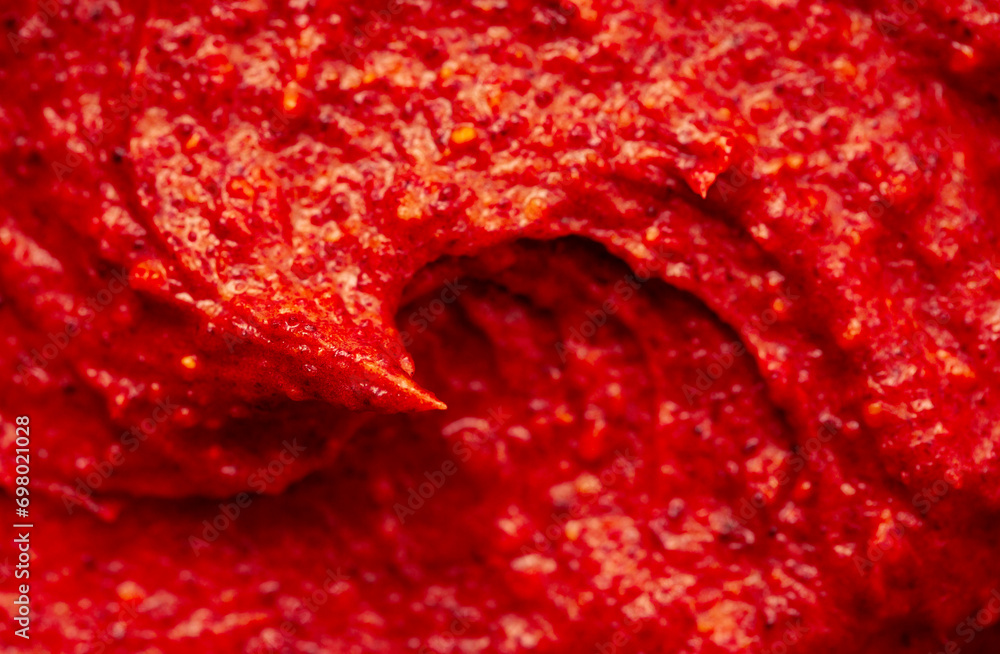 Berry yoghurt ice cream. Smoothies from fresh fruits and berries. Ice cream texture. Delicious sweet dessert close-up as a background. Berry yoghurt ice cream. Smoothies from fresh fruits and berries. Ice cream texture. Delicious sweet dessert close-up as a background.