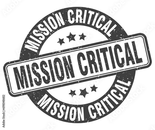 mission critical stamp. mission critical label. round grunge sign