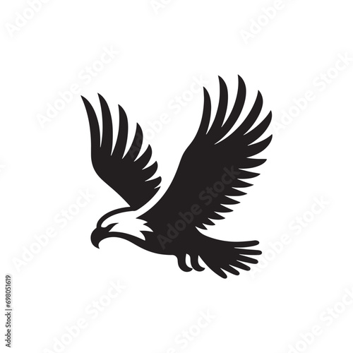 Wings of Freedom: The Flying Eagle Silhouette, Embodying the Spirit of Liberty and Mastery Over the Open Skies.  © Vista