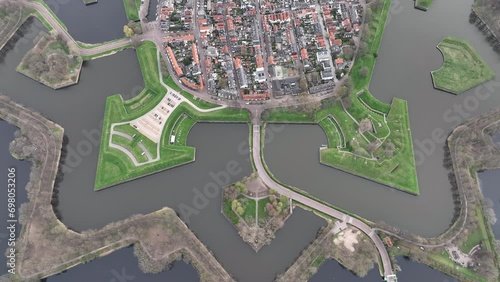 Aerial footage of the Oorlogsmonument Memorial Park and Naarden city in North Holland, Netherlands photo
