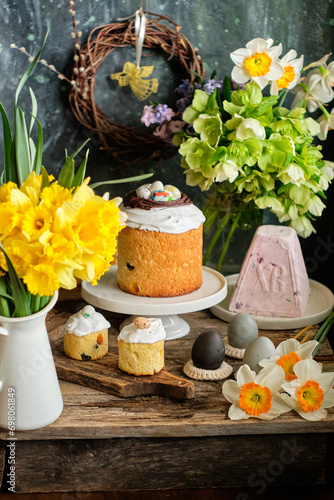 easter still life with easter cake  color eggs  Curd Easter cake and spring flowers