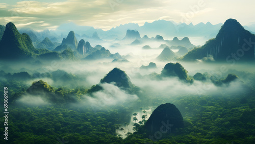 Flowing mist in high mountains rising above a lush tropical rain forest