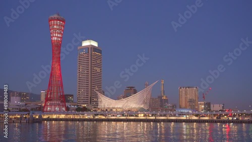 Kobe is a city on Osaka Bay in central Japan,  View of Kobe Port at dusk
