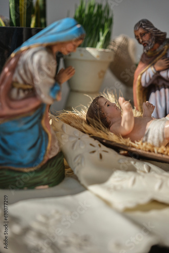Christmas nativity scene with baby Jesus Joseph and Mary (ID: 698077209)