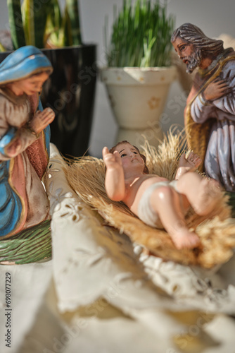 Christmas nativity scene with baby Jesus Joseph and Mary (ID: 698077229)