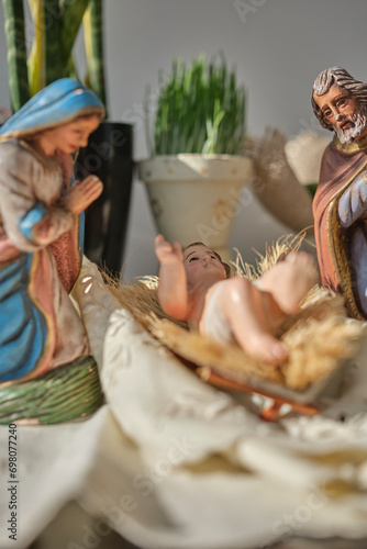 Christmas nativity scene with baby Jesus Joseph and Mary (ID: 698077240)