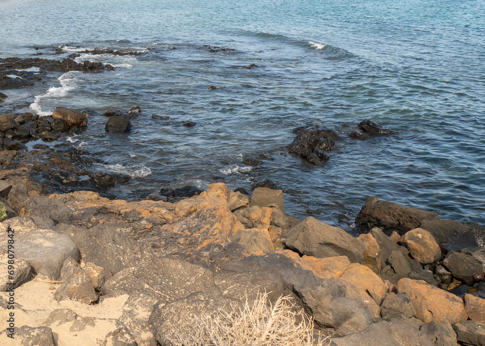 Rocky Shoreline with a Clear Blue Sea View
