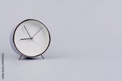 Time and work of every day Photo of a modern alarm clock in a studio