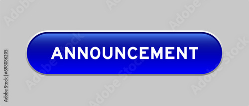 Blue color capsule shape button with word announcement on gray background
