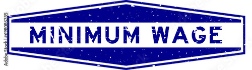 Grunge blue minimum wage word hexagon rubber seal stamp on white background
