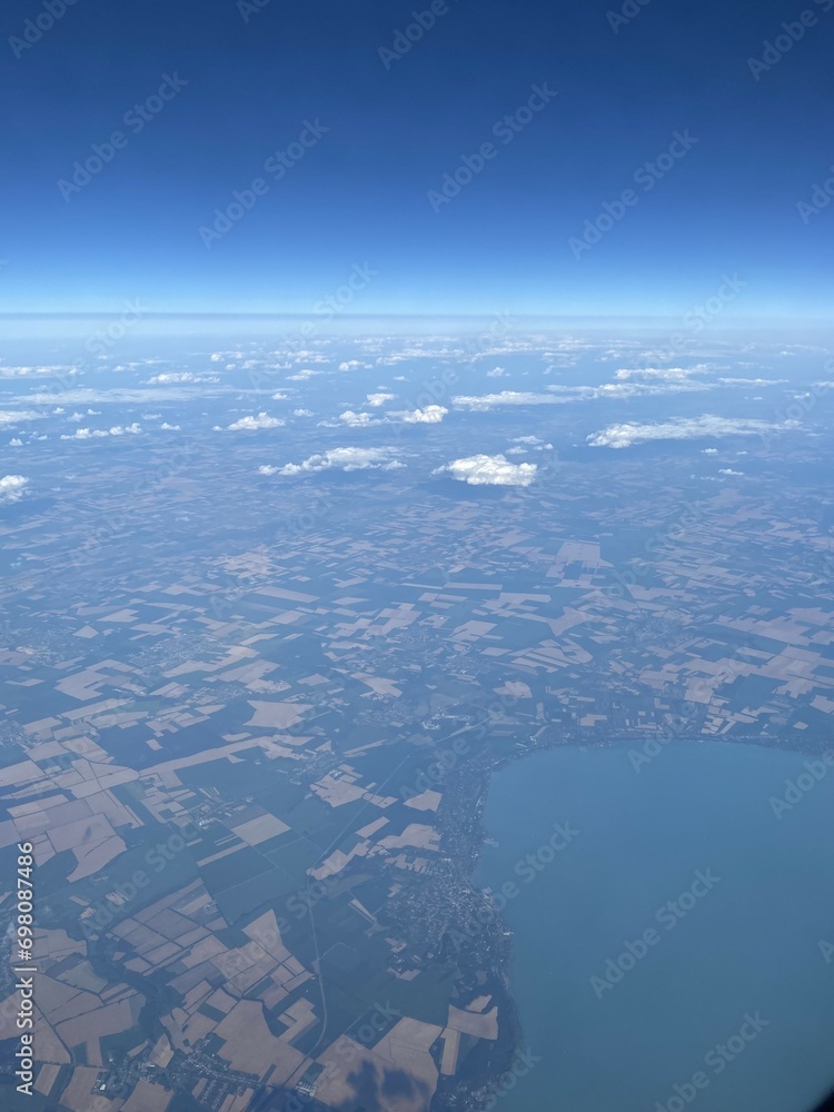 view from plane over europe blue sky view from plane over europe blue sky