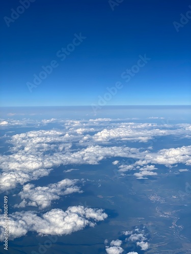 view from plane over europe blue sky