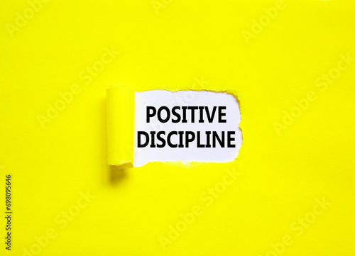 Positive discipline symbol. Concept words Positive discipline on beautiful white paper. Beautiful yellow paper background. Business psychology positive discipline concept. Copy space.