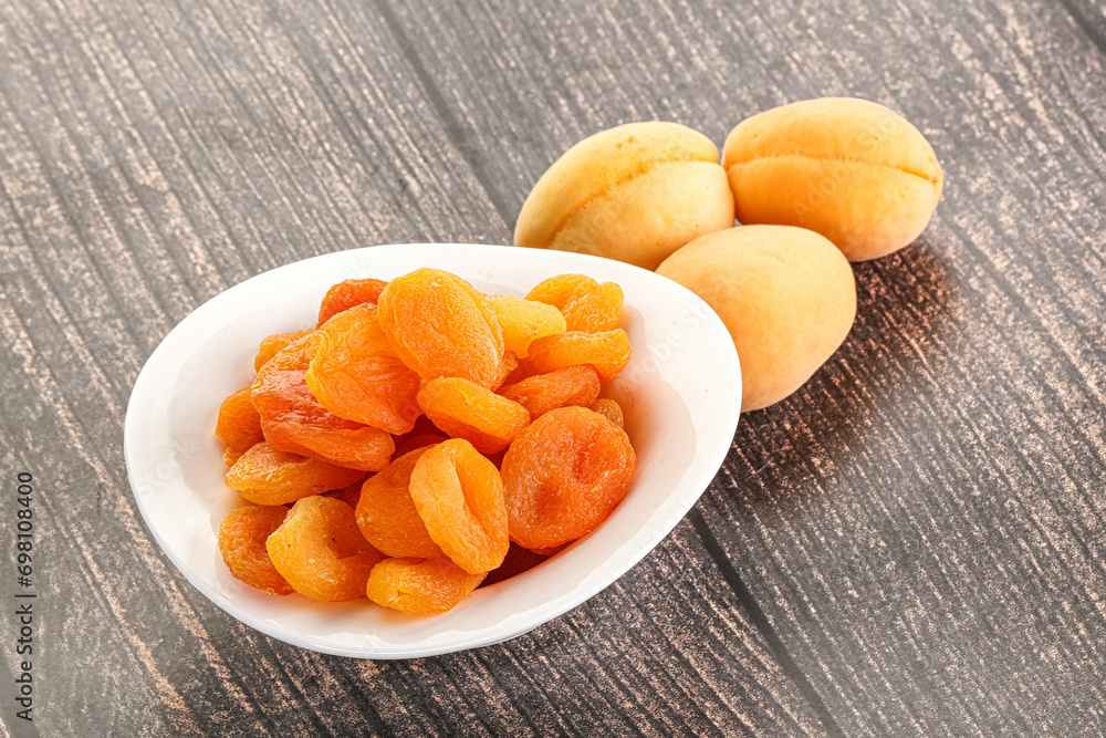 Dried apricot heap in the bowl Dried apricot heap in the bowl