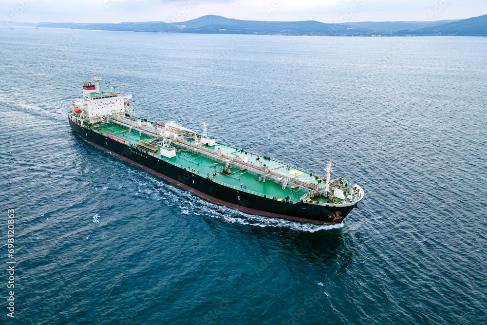 Crude oil carrier ship transport liquid cargo underway through Dardanelles Strait, Aerial view