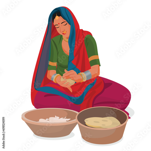 Indian Rajasthani woman cooking food roti bread