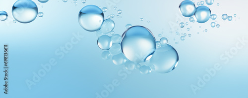drop of liquid gel serum , texture micro bubble on blue background, beauty concept