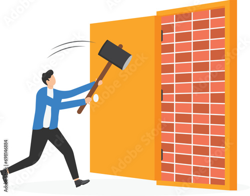 Businessman open exit door and found brick wall blocking the way. Man with sledgehammer about to brick wall blocking the way. Business dead end obstacle and difficulty to overcome.

