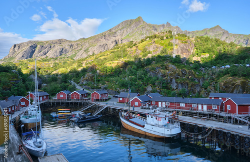 fishing boats in the harbor in the lofoten