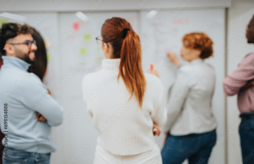 Colleagues brainstorming, collaborating, and discussing strategies for business expansion and profit growth in a successful corporate office setting. Colleagues brainstorming, collaborating, and discussing strategies for business expansion and profit growth in a successful corporate office setting.