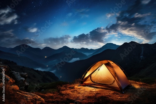 Tent in the mountains at night with starry sky and clouds, Illuminated camp tent under a view of the mountains and a starry sky, AI Generated