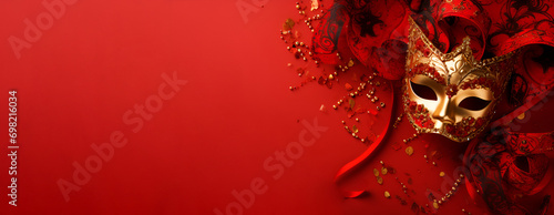 A majestic golden carnival mask showcased against a bold red background, Mardi Gras photo