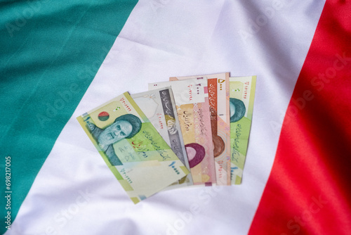 iranian money on italy flag photo