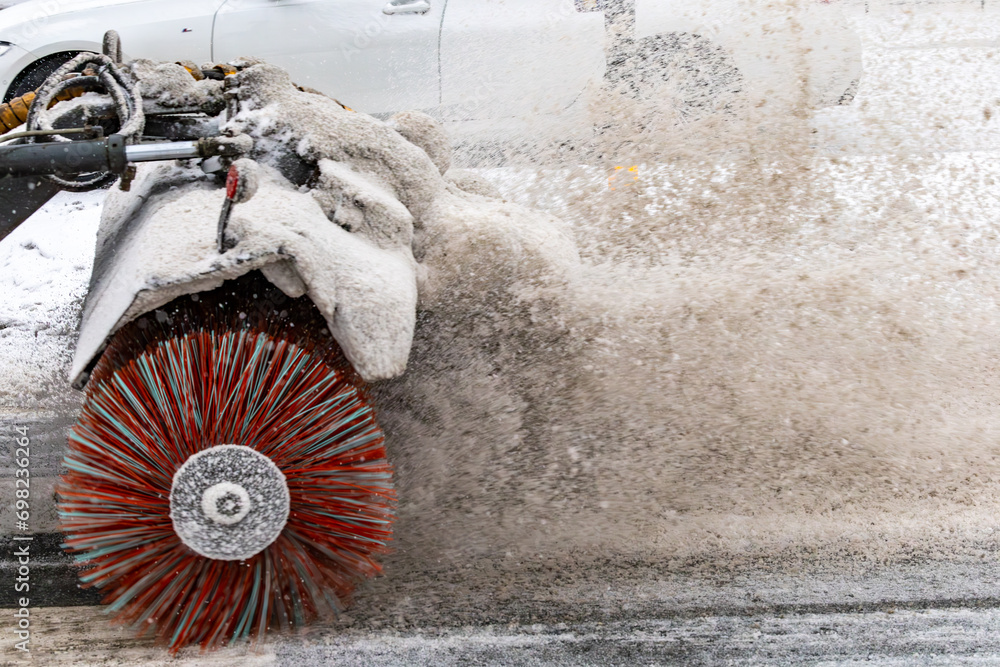 Stockholm, Sweden, A Snowplow on the street during a snow storm. - obrazy, fototapety, plakaty 