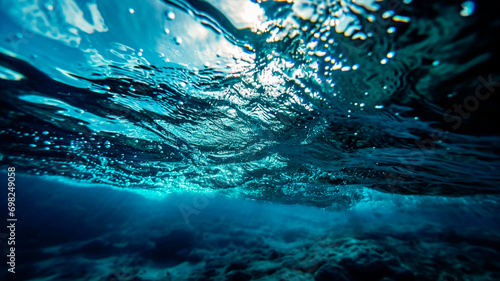 Dark blue ocean surface seen from underwater. Generative AI