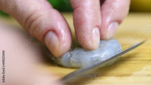 Prepare peeled raw shrimp for cooking. An episode from a series of recipes for making breaded fried shrimp. Close-up. Real time.