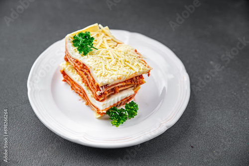 lasagna bolognese meat dish second course eating cooking appetizer meal food snack on the table copy space food background rustic top view