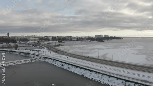 Wallpaper Mural Drone footage of cars driving on the Blue Highway road at sunset in Vaasa city, Finland Torontodigital.ca